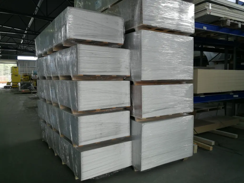 Cross wrapped gypsum boards in store