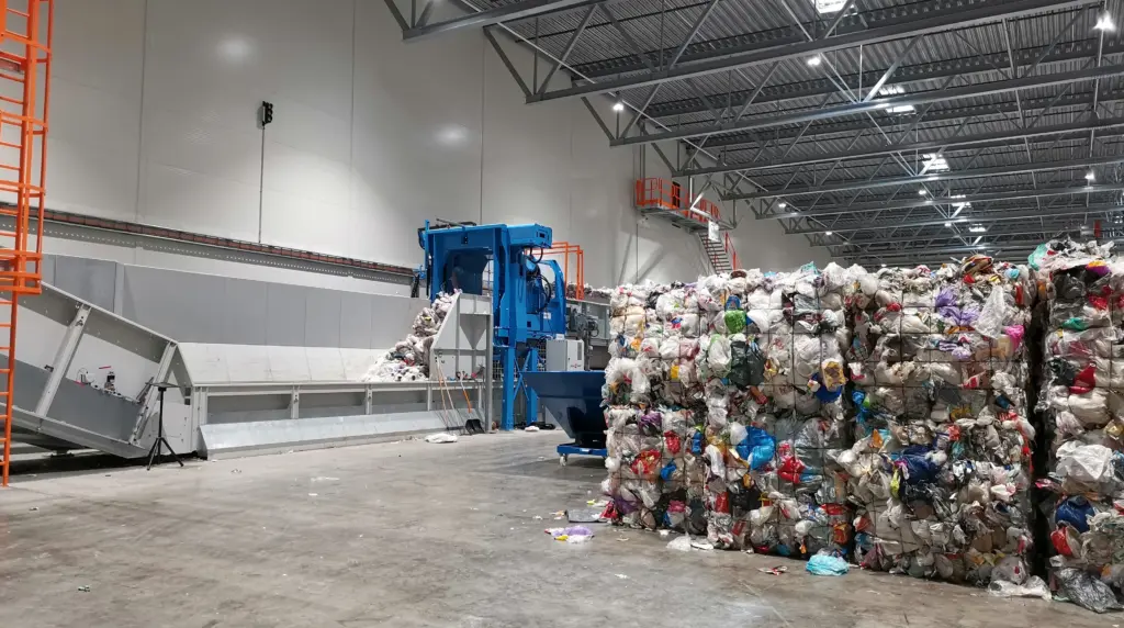 Recycled plastic bales at the storage area waiting for dewiring and other processing